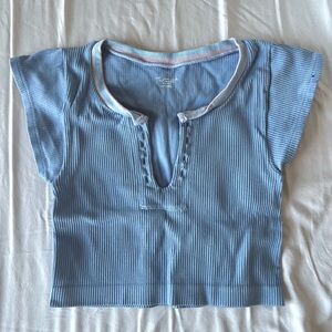 Go for Gold, Out from under Urban Outfitters blue top